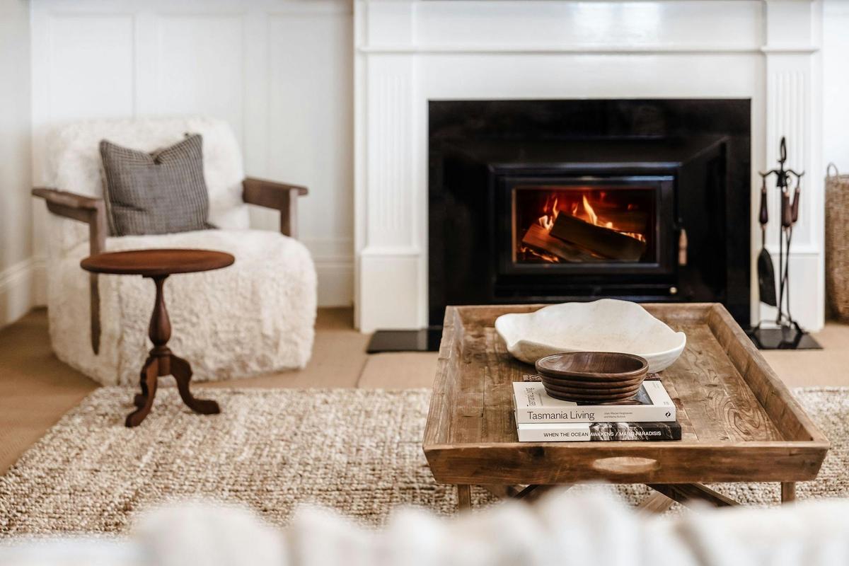 The roaring fire is a welcoming welcome to the formal living room in the colder months
