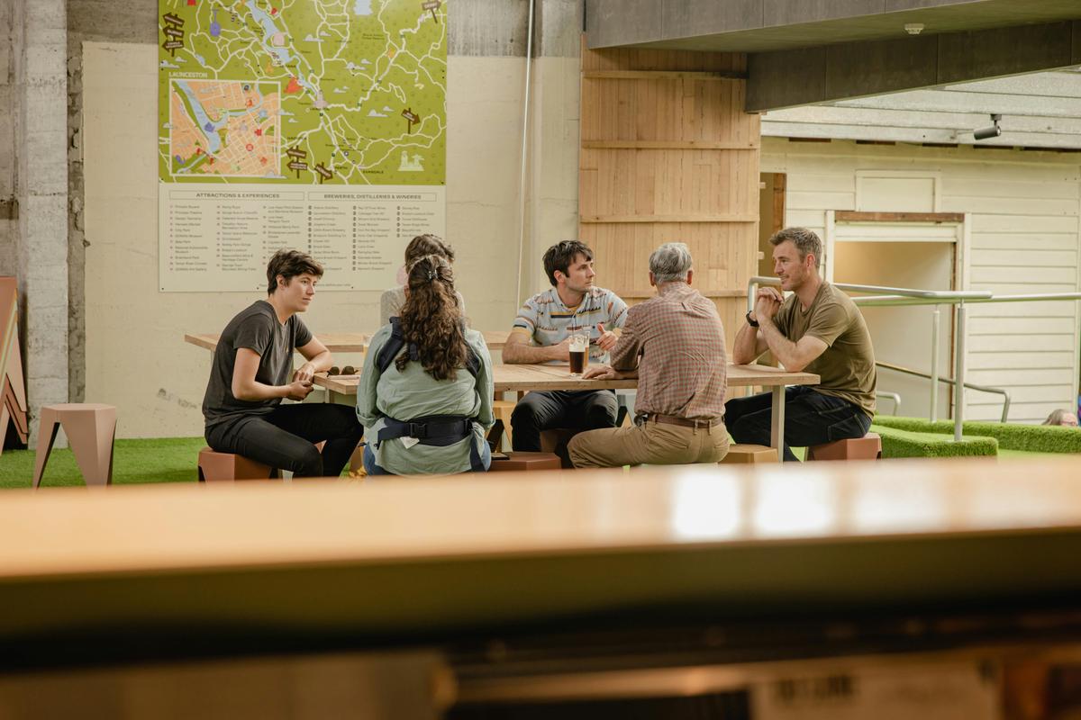 Visitors lunching @ a table
