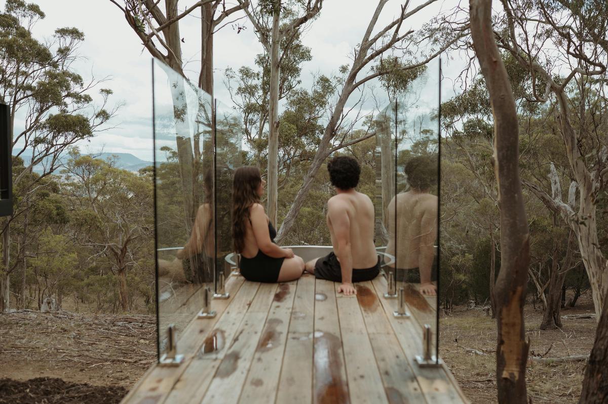 Relax in the hottub with a view across the tree tops