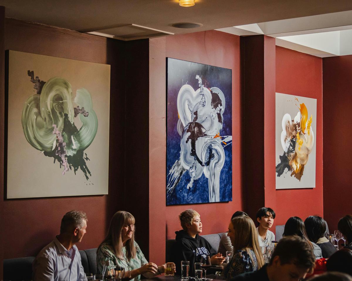 main dining, artworks by local artist John Wren