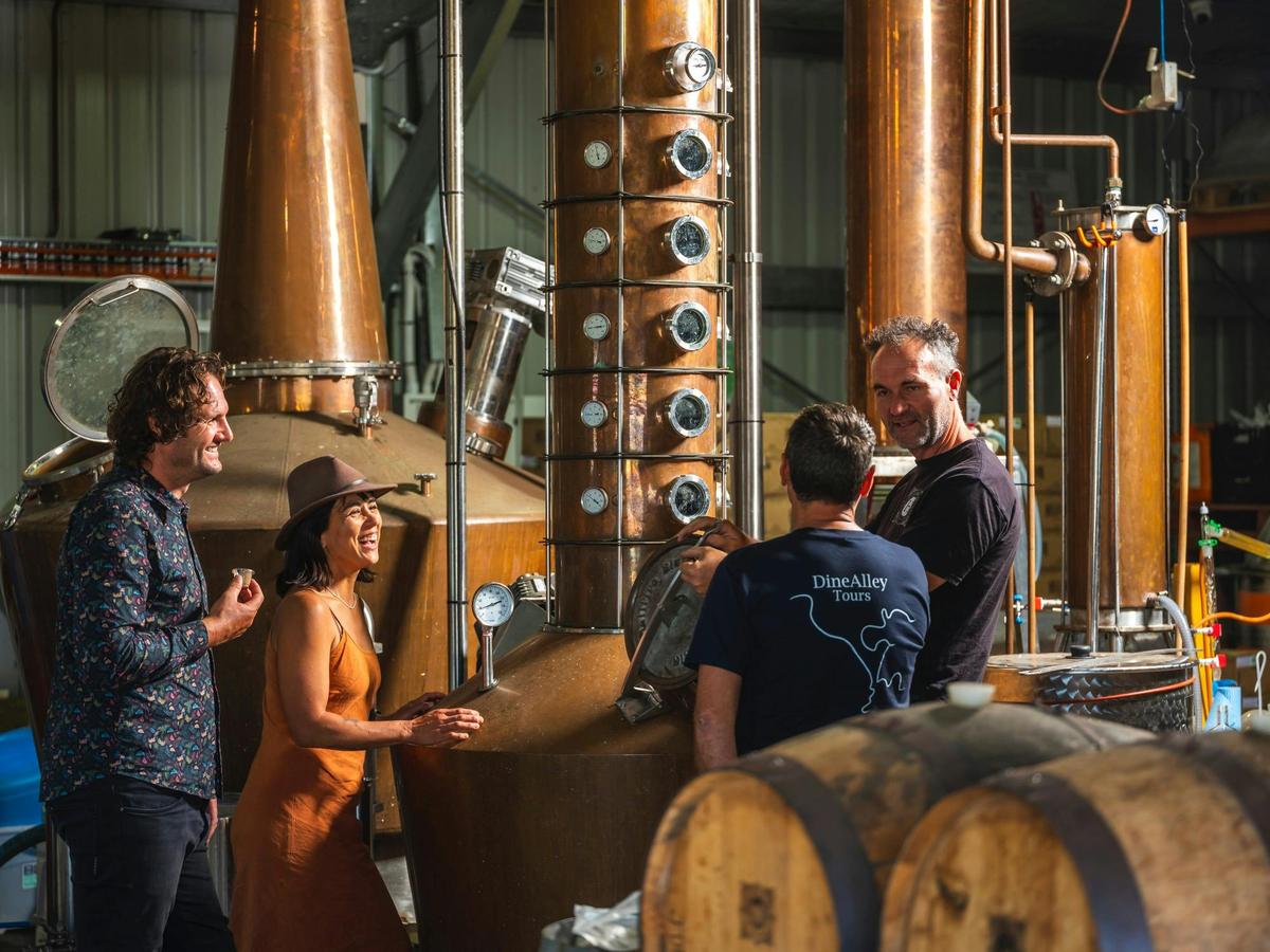 Guests in rare potato ade vodka distillery on working farm