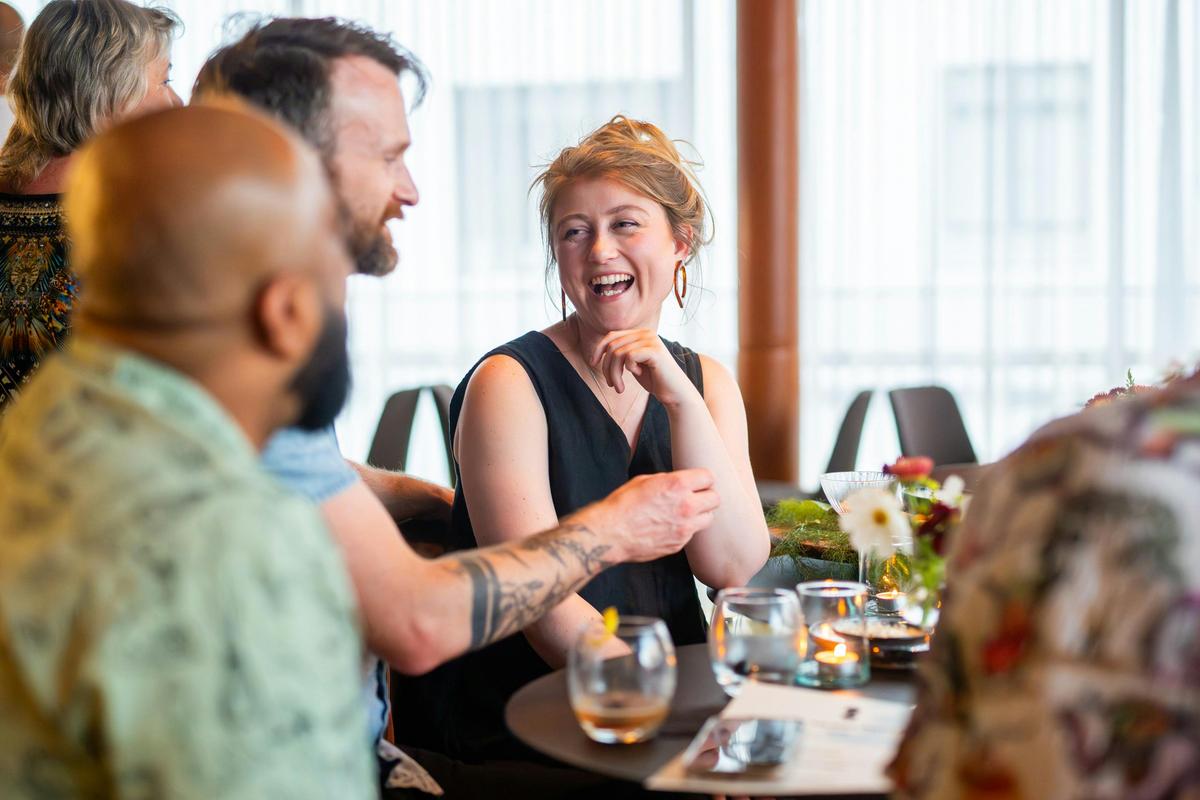 Customers chatting at Dill Pickle Club