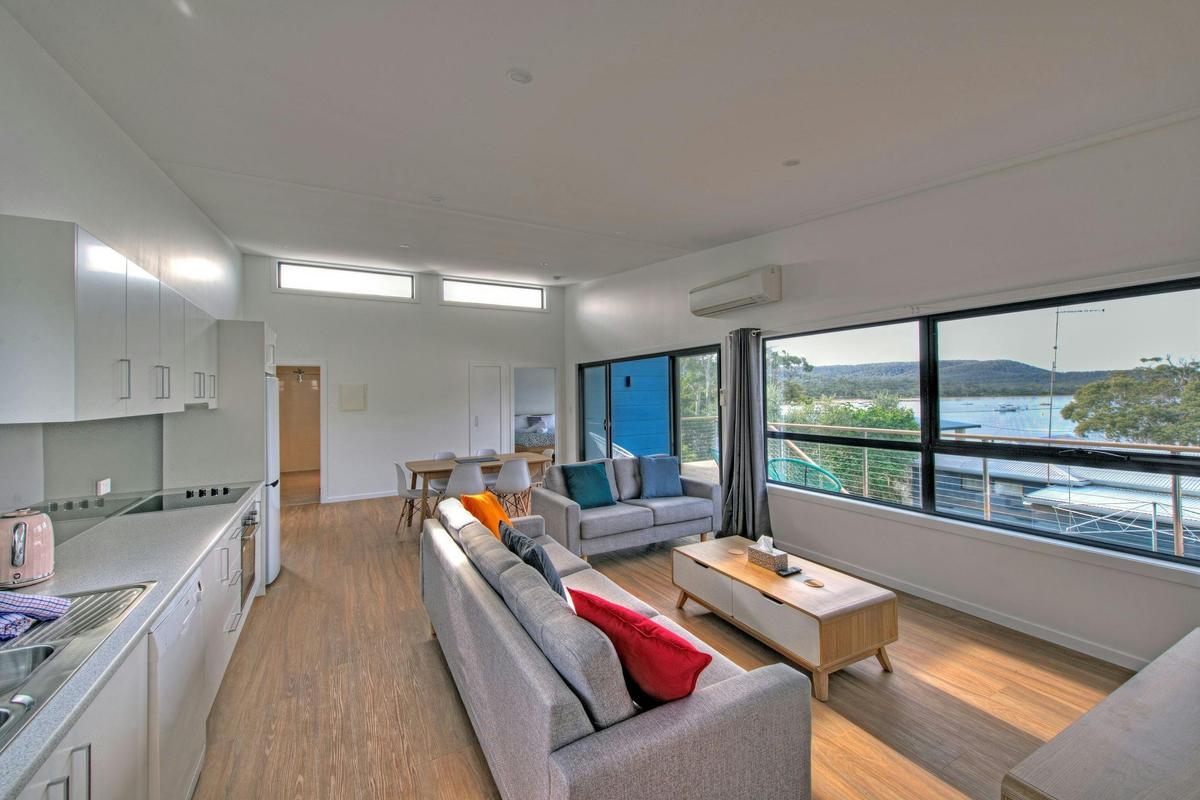 A sunny and bright living area with open plan design