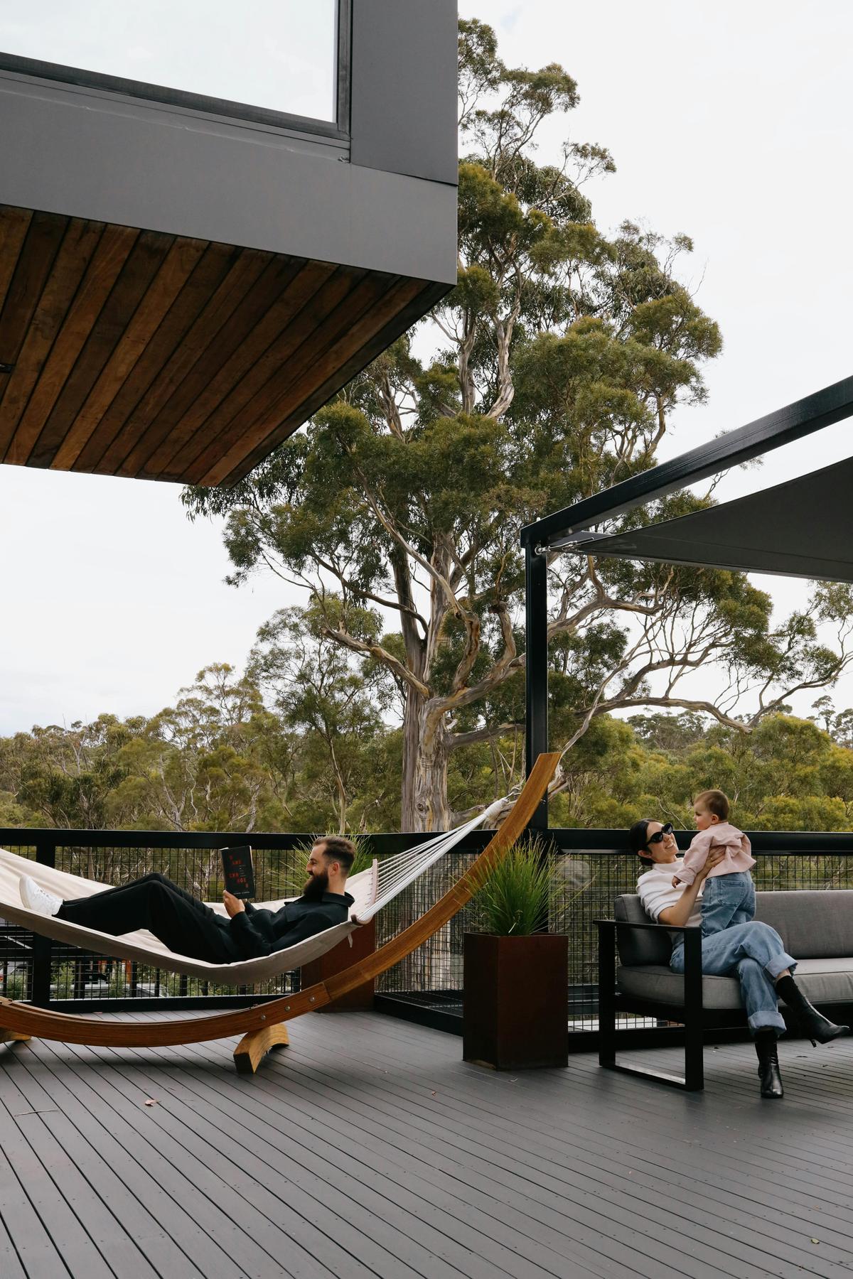 Hammock on a private deck overlooking native bushland—ideal for quiet moments or shared relaxation