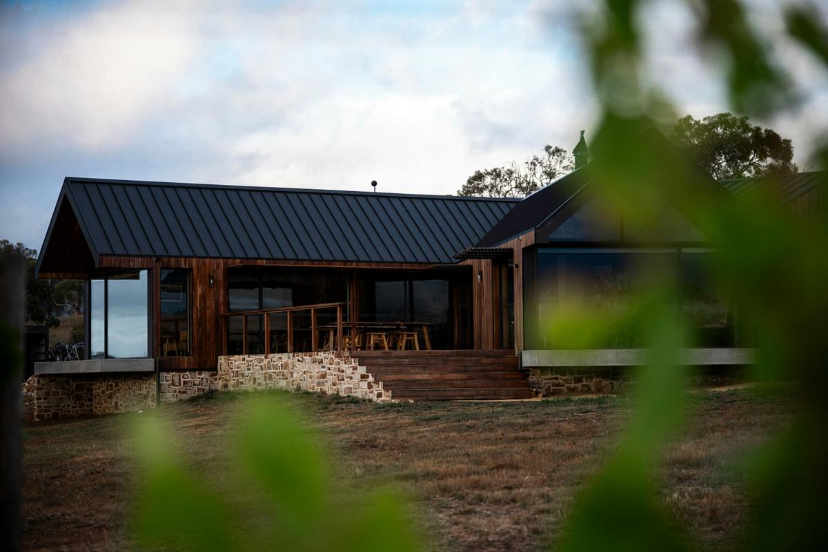 The Caledon Cellar Door nestles into the vineyard with views over Richmond, Tasmania.
