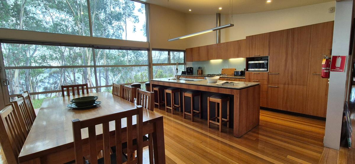 Kitchen with dining table and views