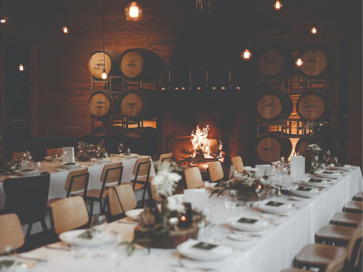 Winter wedding in the Barrel Room in front of the open fire.