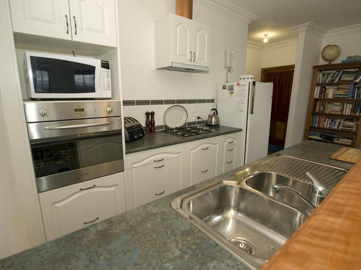 Kitchen with induction hotplate (gas has been replaced)
