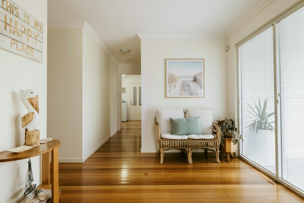 Step through your private entrance onto beautiful wooden floors.