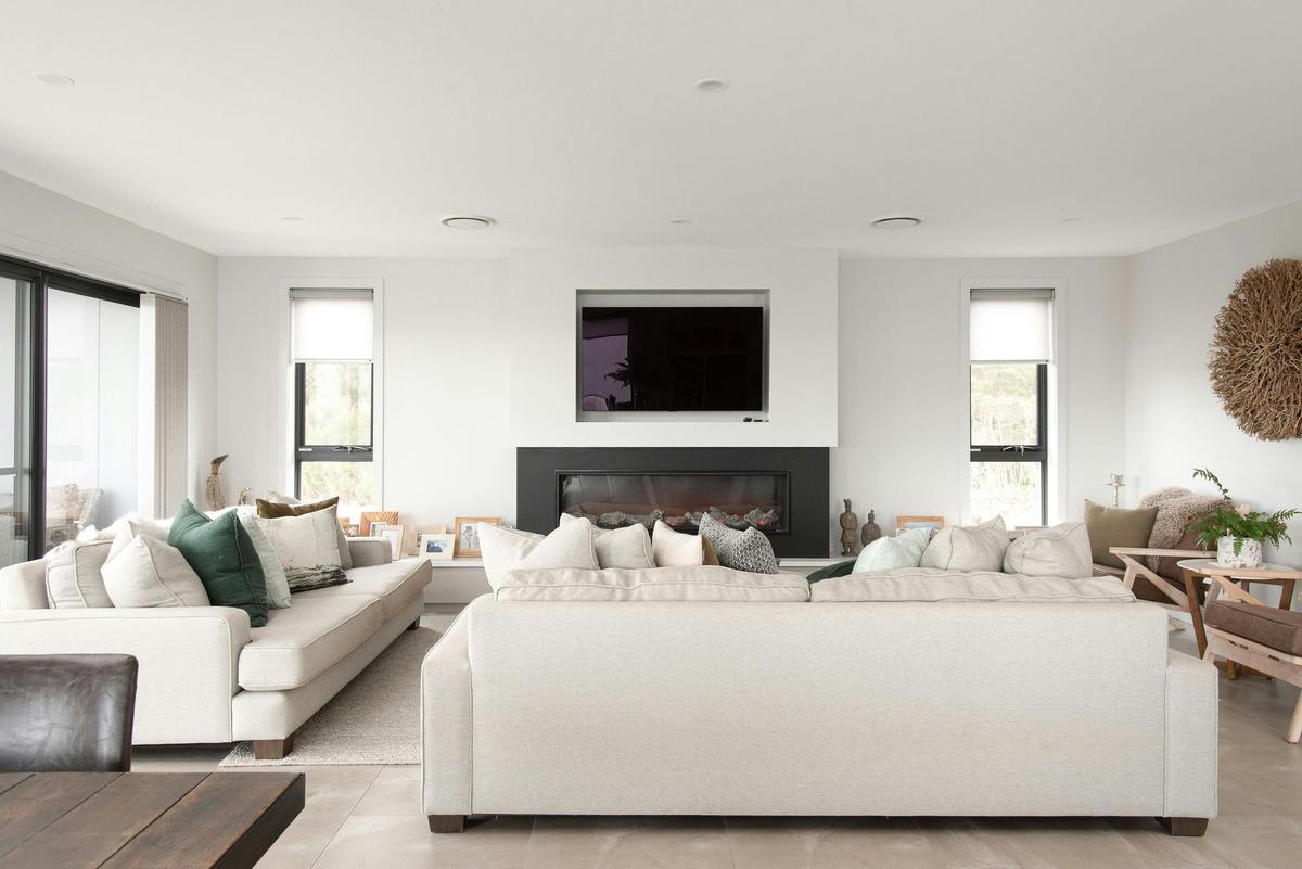 Sink into plush sofas and enjoy the electric heater and 65" smart TV.