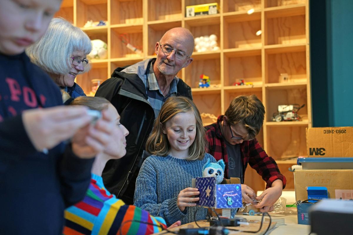 Grandparents and children in the Tasmanian Science Centre at Hive