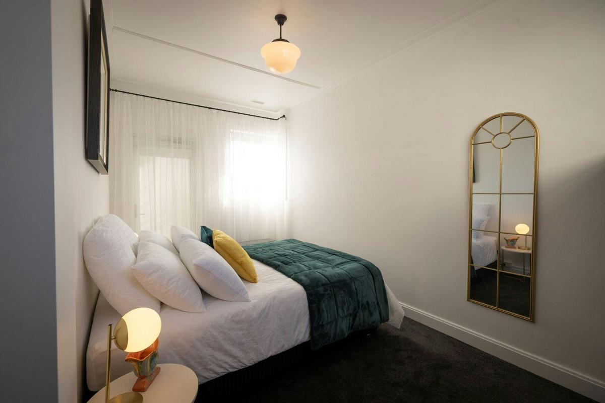 Queen-sized beds, with sumptuous linens and period-inspired accents for a restful night's sleep.