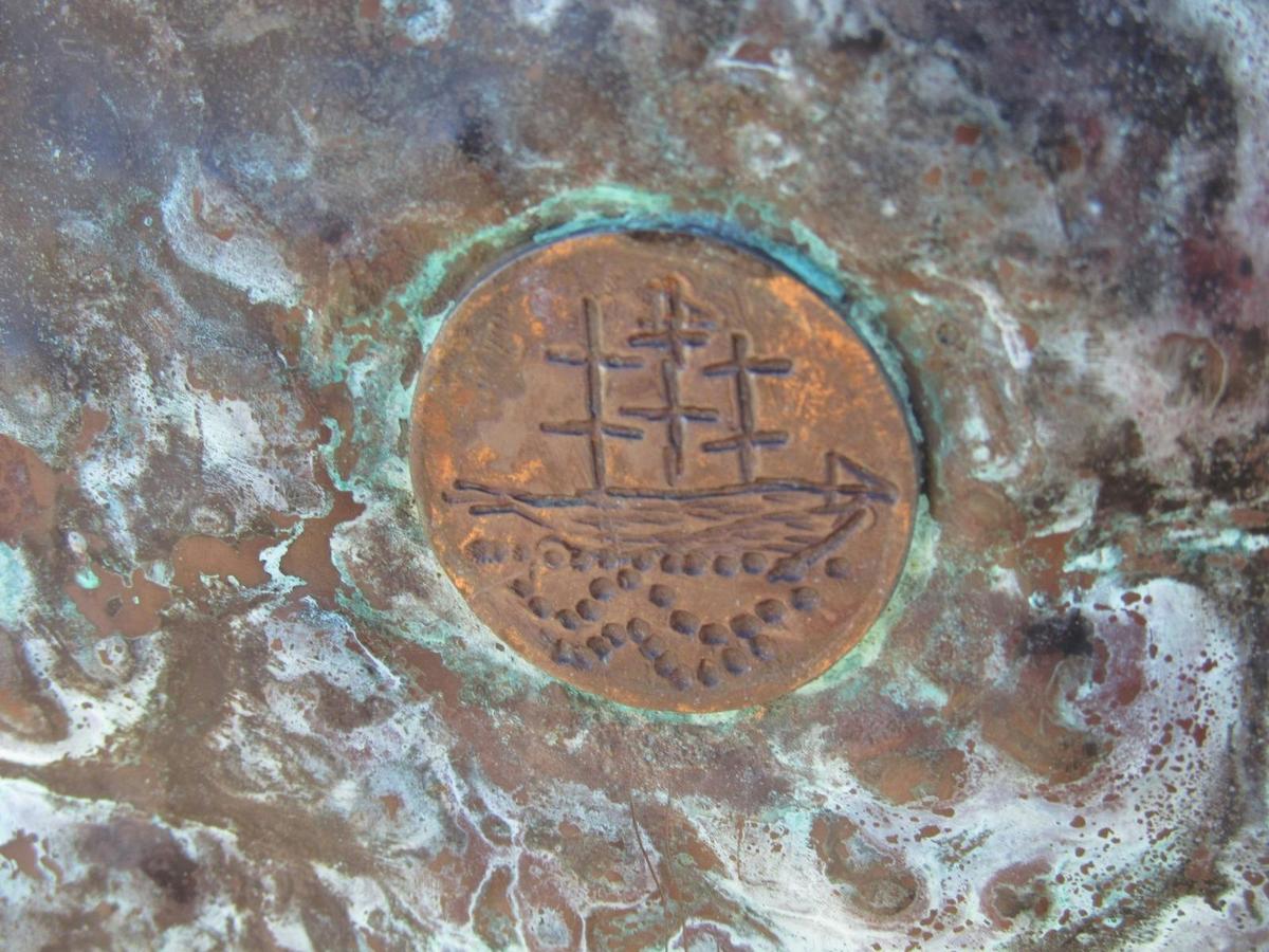 Ship engraved on a copper disc