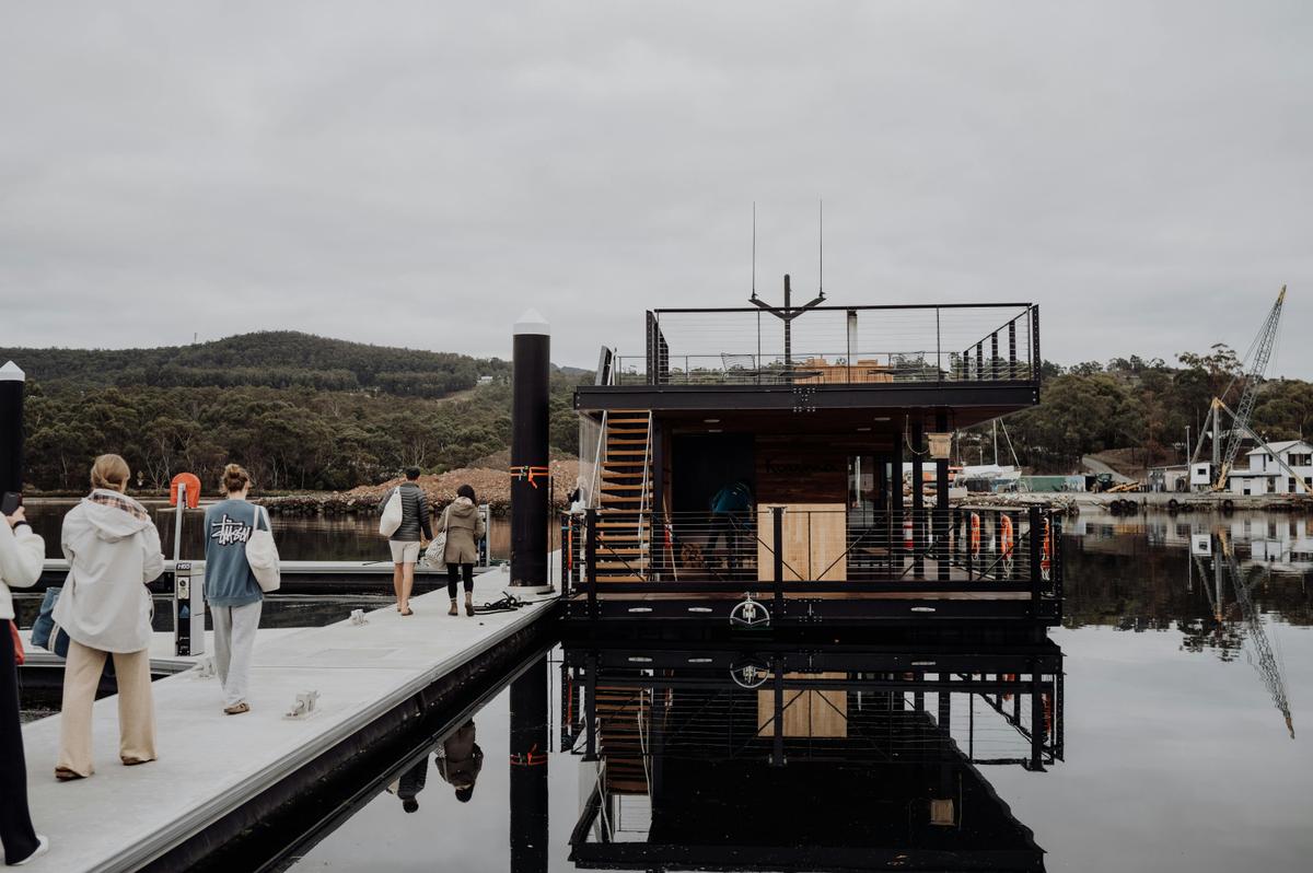Kuuma sauna pontoon boat at berth in Southern Tasmania