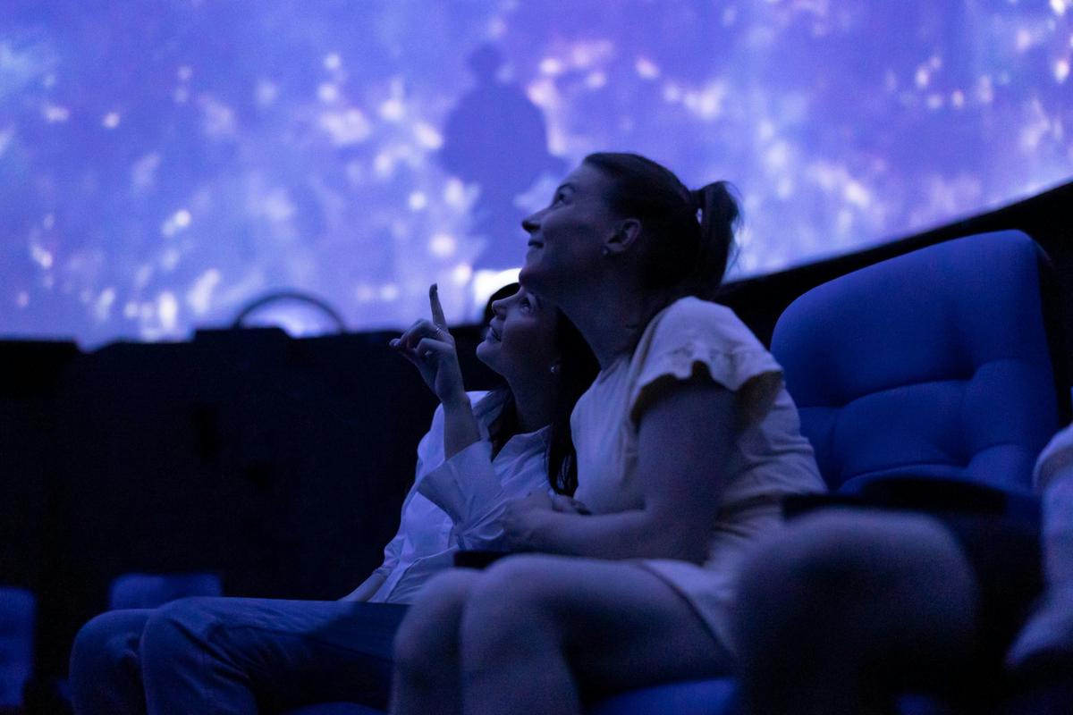 Under the full-dome screen of the Launceston Planetarium.
