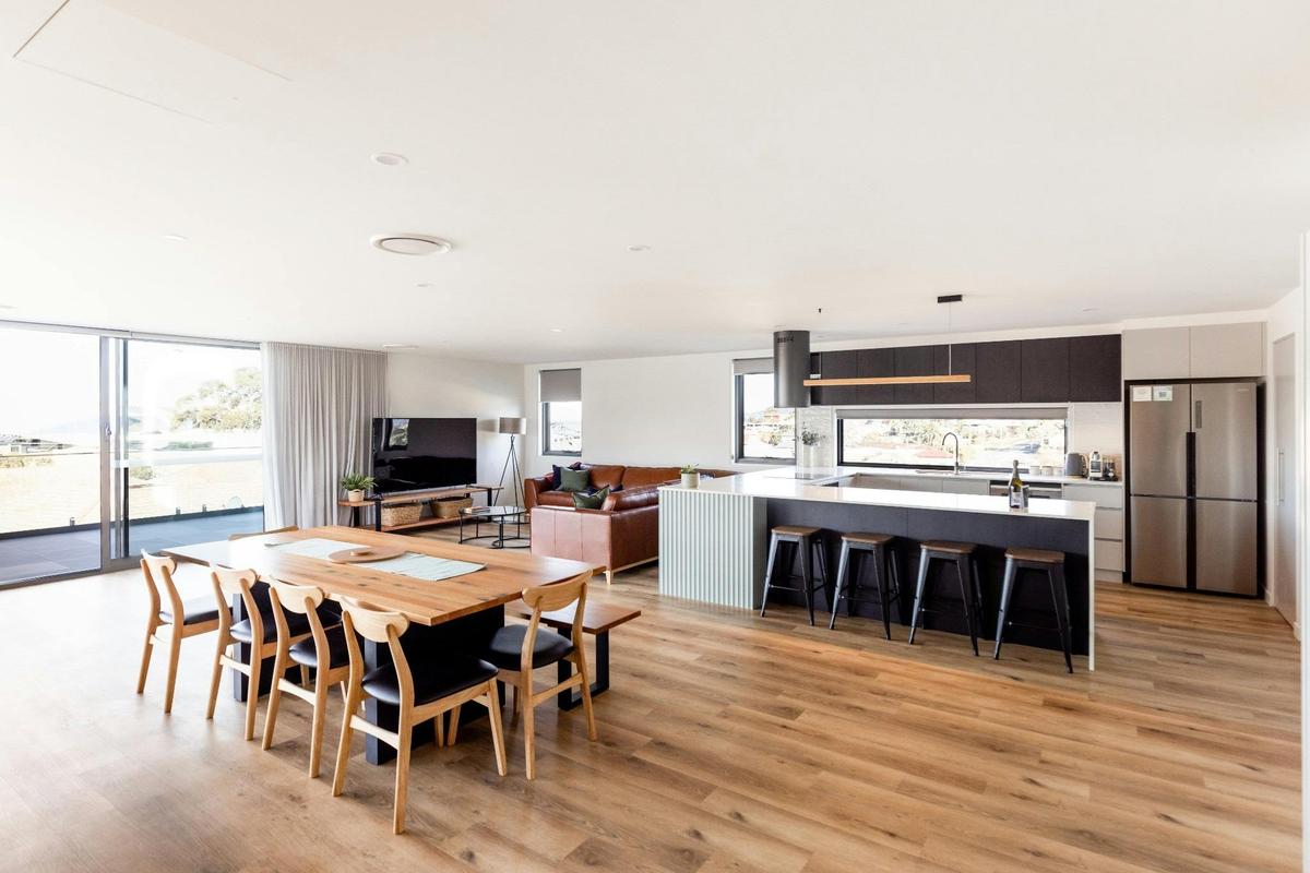 Open plan living, dining and kitchen areas