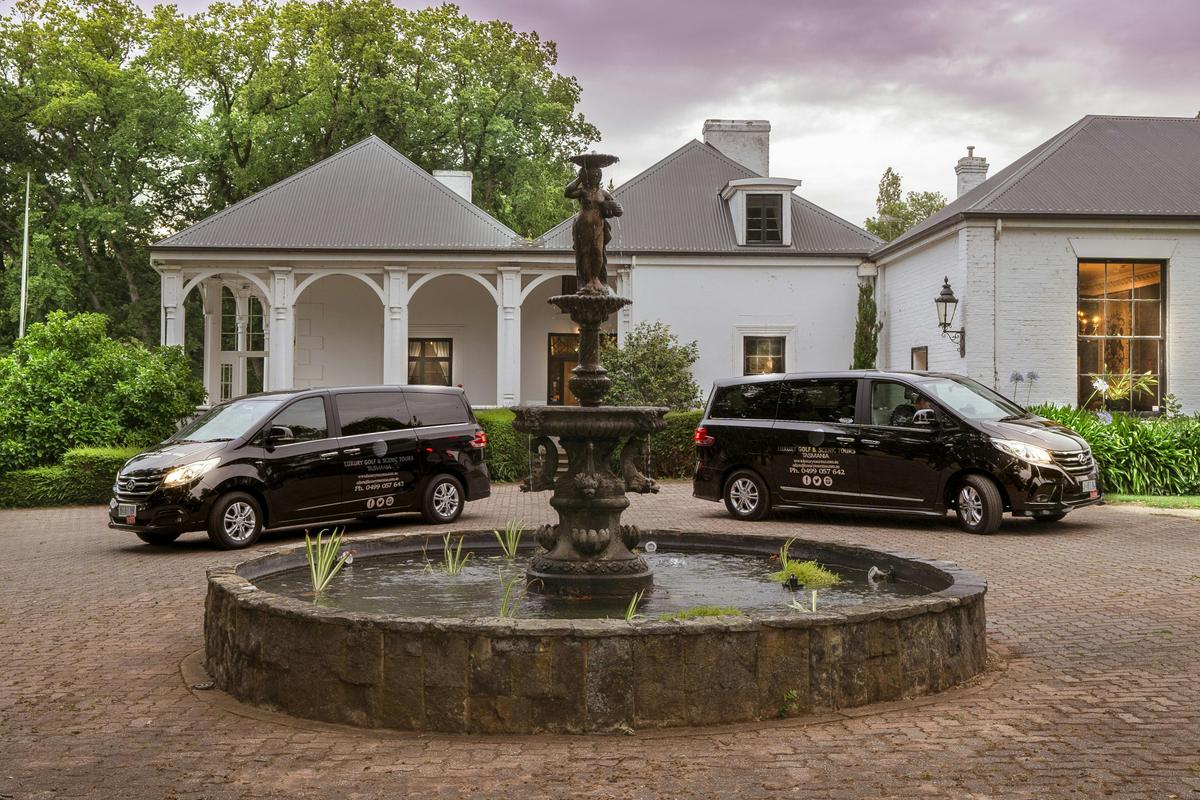Our luxury vans in front of the gorgeous Quamby Estate