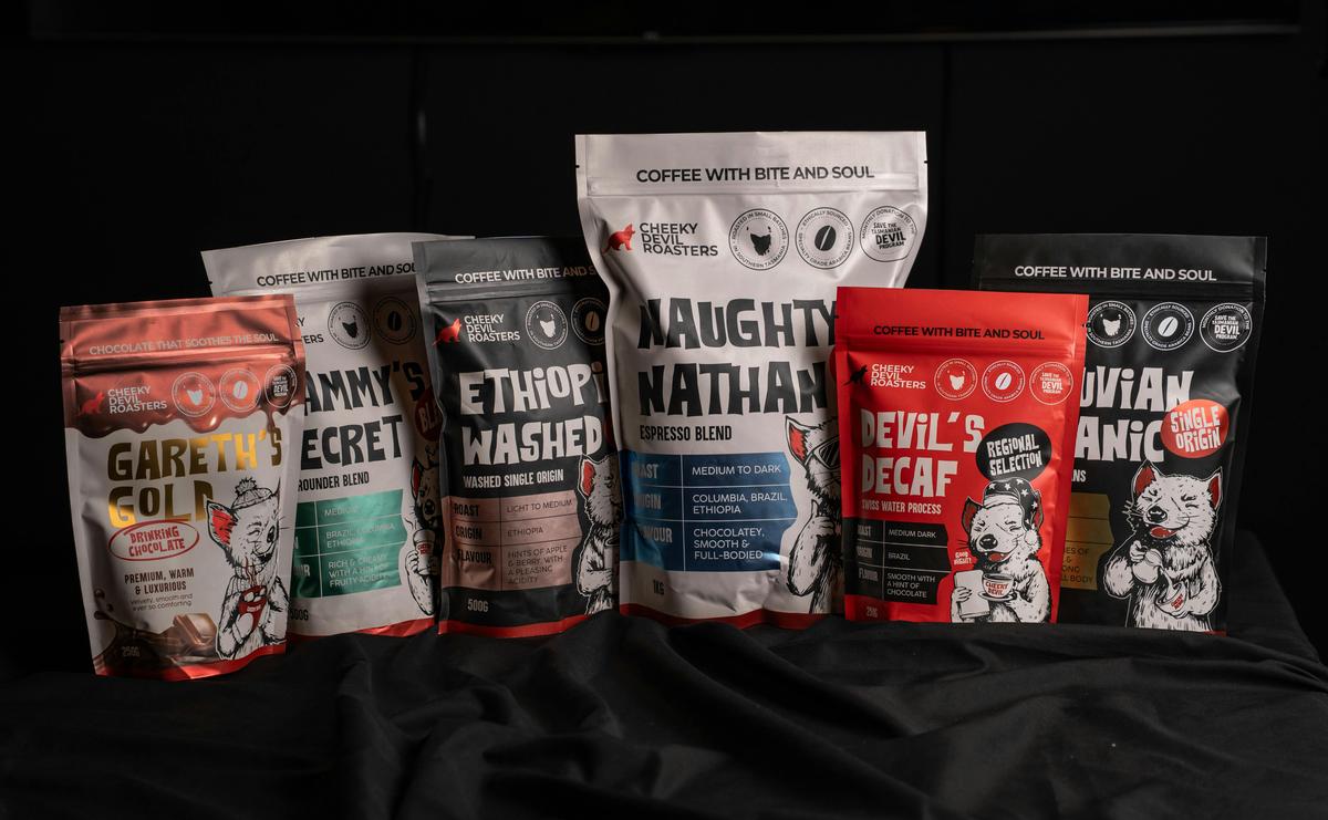 A selection of Cheeky Devil coffee beans and drinking chocolate.