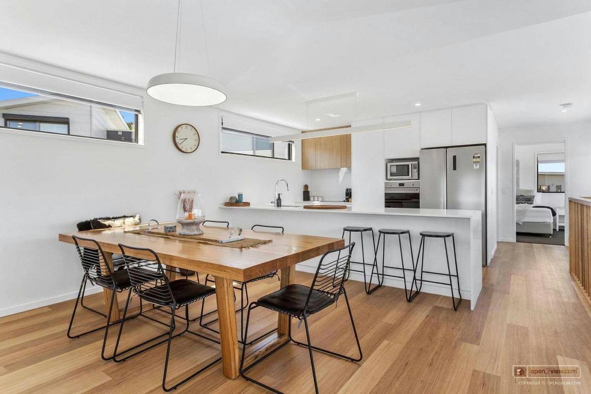 OPen plan living with large dining and kitchen area