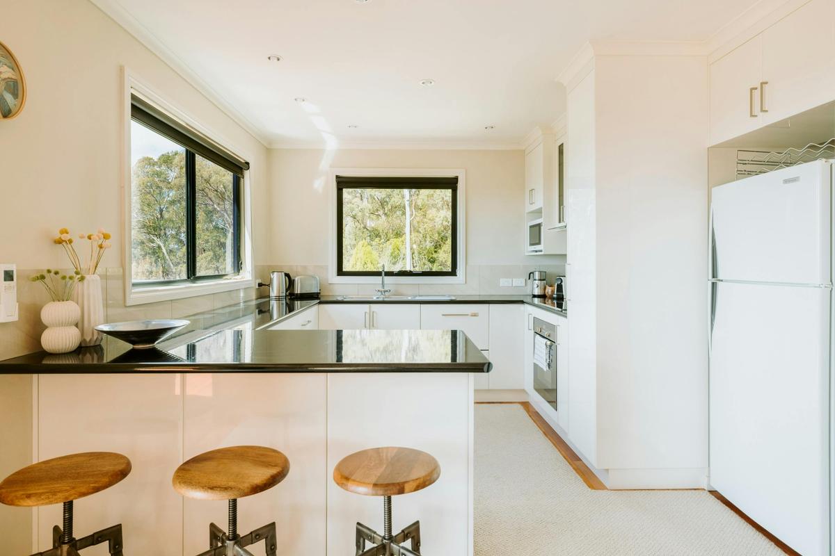 Cook and sip in style -fully equipped kitchen with coffee machine, and stunning panorama views.