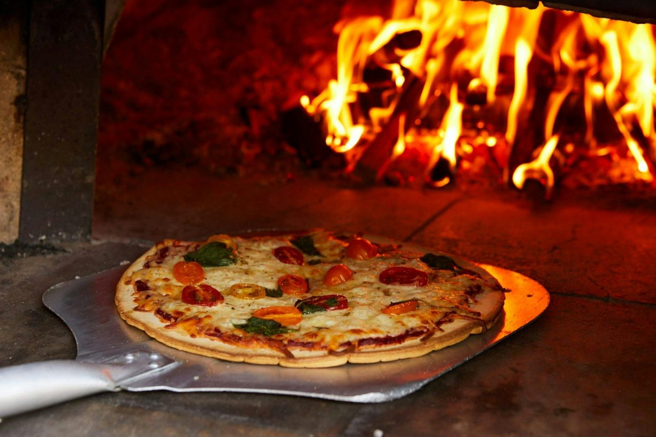 Truffle Pizza cooked in wood fired pizza oven