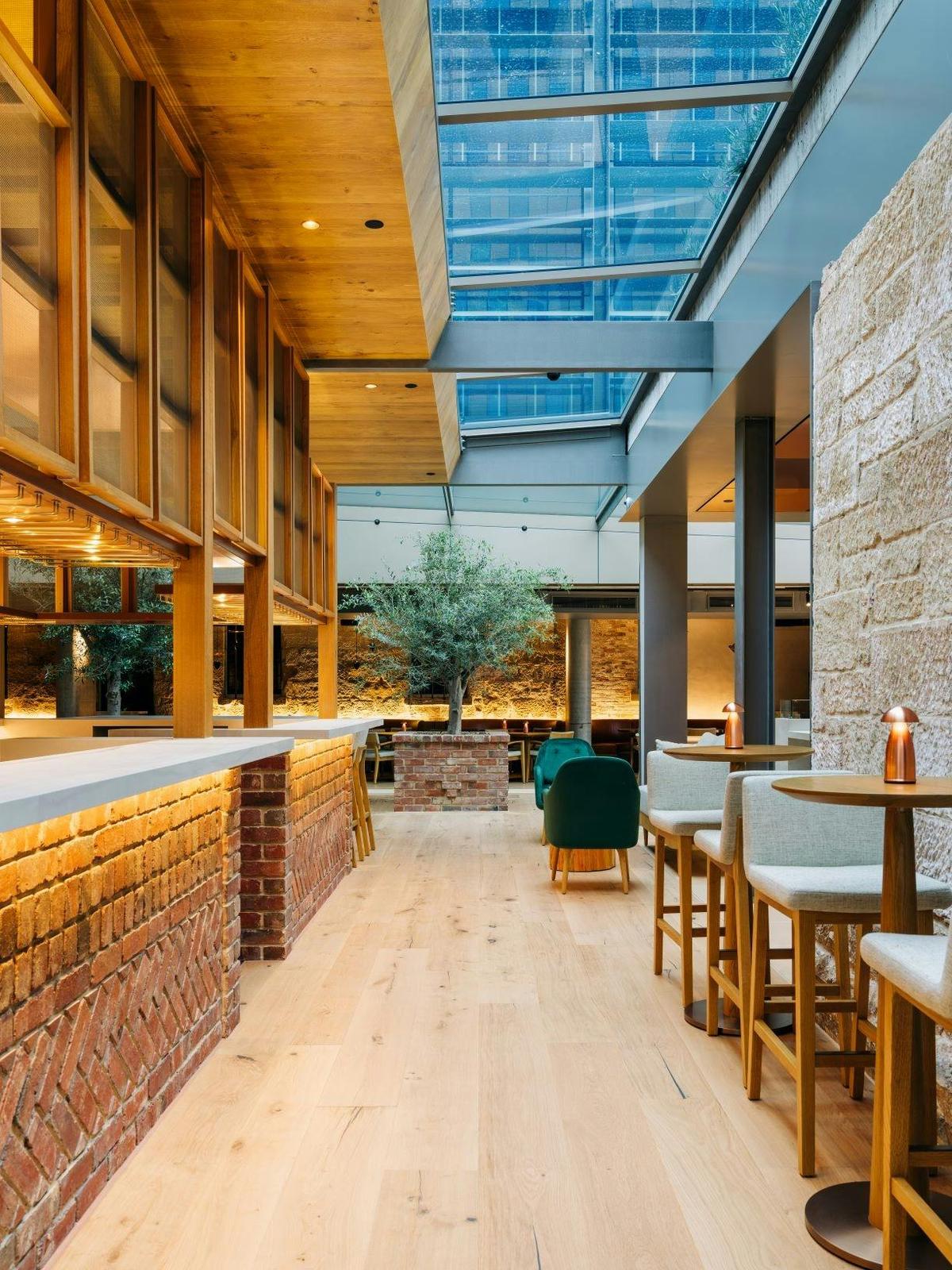 Peppina courtyard bar within heritage brick walls