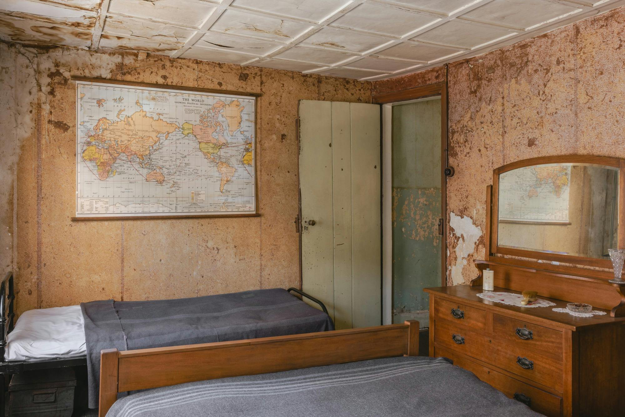 Historic bedroom with two single beds