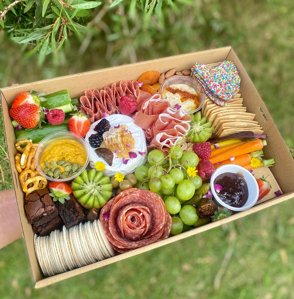 Grazing platter filled with delicious Tasmanian cheese and produce