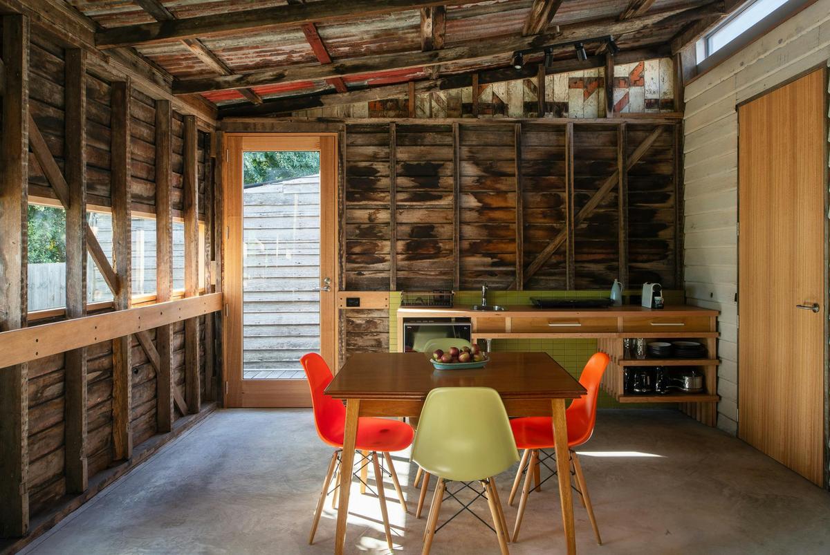 Dining area and accessible kitchenette featuring old and new Tasmanian Oak