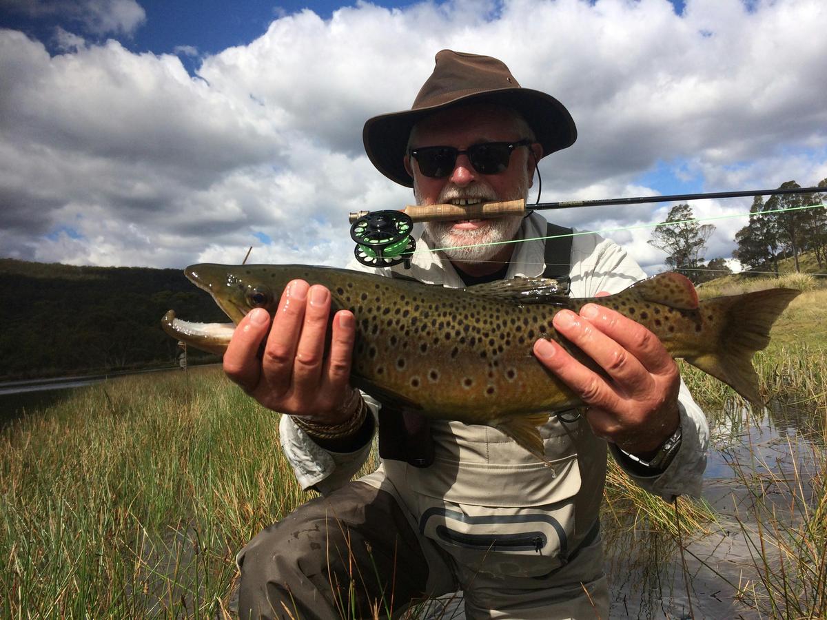 Fly fishing Tasmania’s highland lakes — clear water, open space, and wild trout.