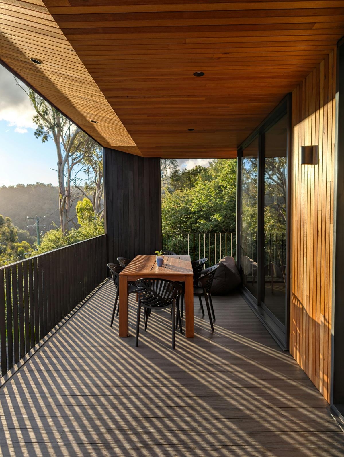 Private deck with barbecue, outdoor seating and landscaped garden