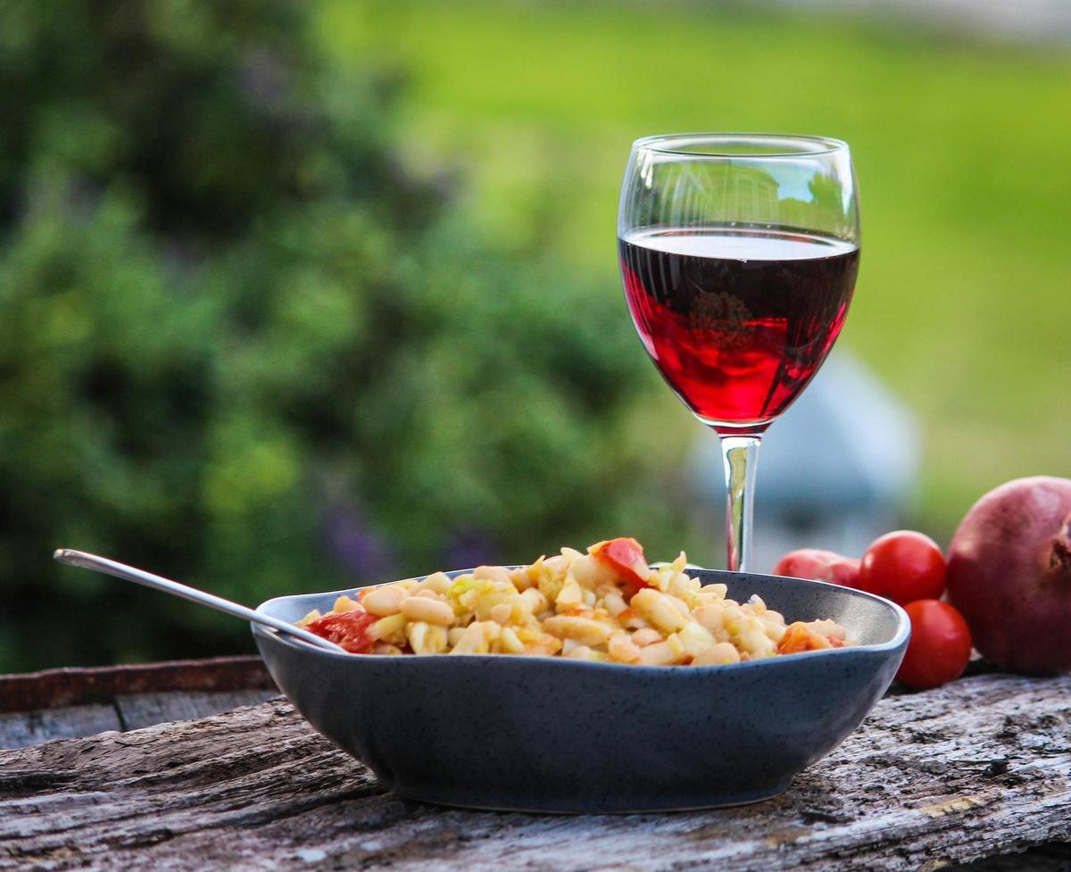 Pasta e fagioli with a glass of Tassie red