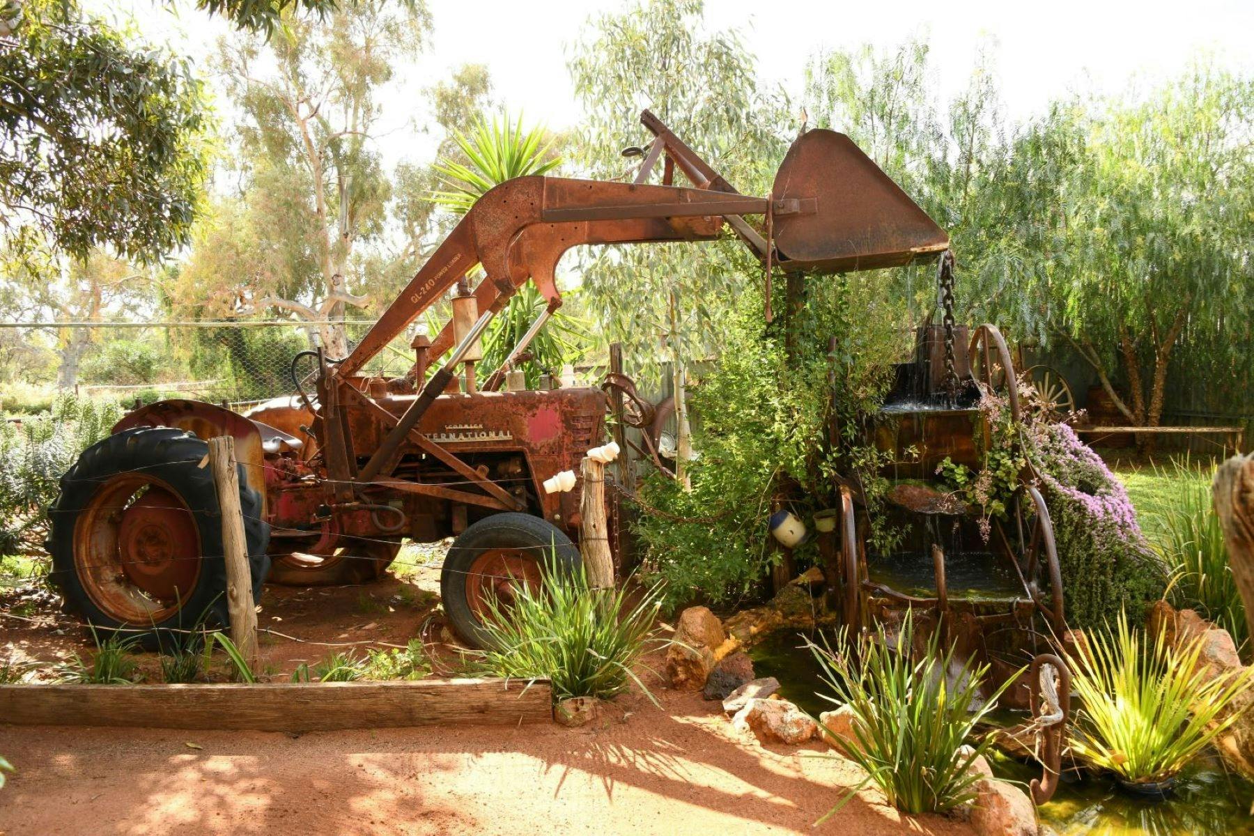 An old tractor converted into a water feature