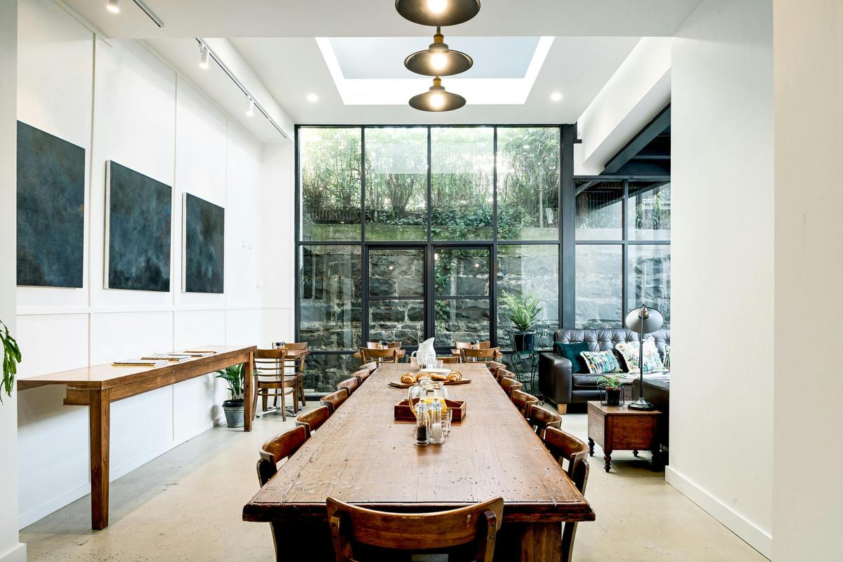 A communal table for the daily breakfast, work, dinning or personal leisure.