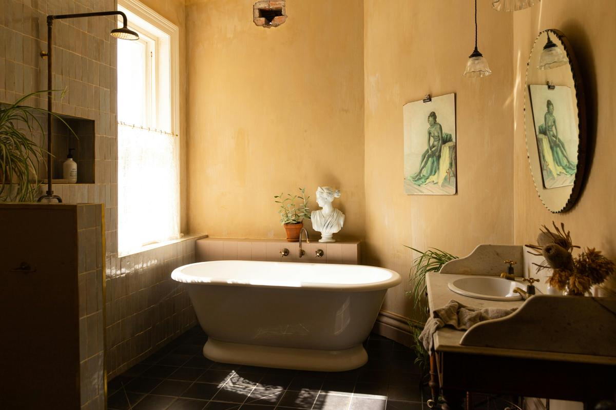 The luxurious bathroom with walk-in shower, deep tub to soak away the  cares.