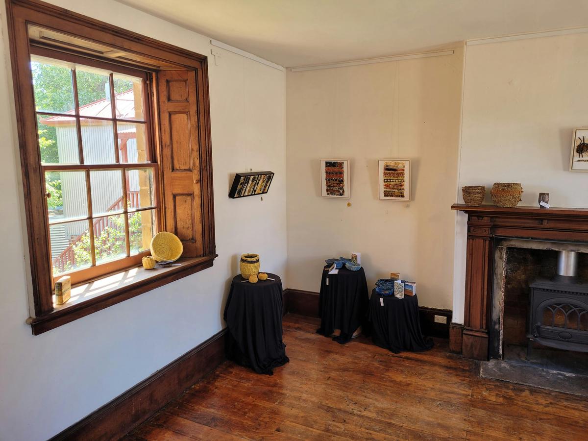 Georgian cedar shutters in the 1845 Parlour.  Exhibition: Mahdi Chandler, Confluence, October 2023.