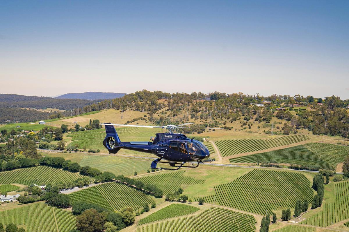 EC130 over Tamar River
