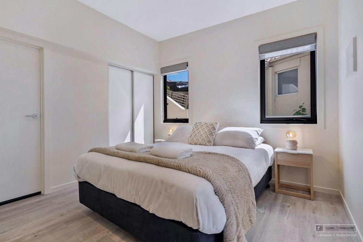 Comfy queen size bed with buit in robe.