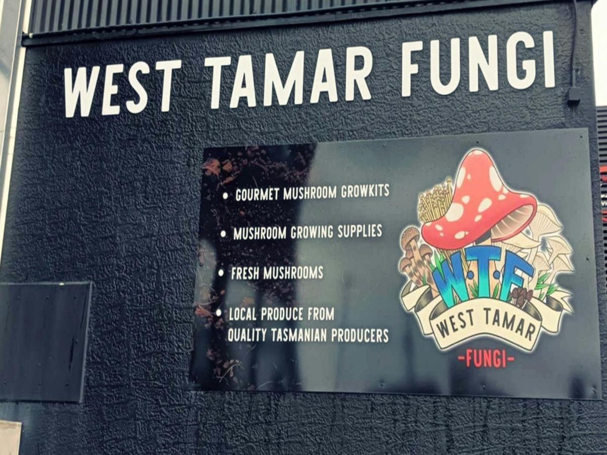 Outside Sign on side of shop