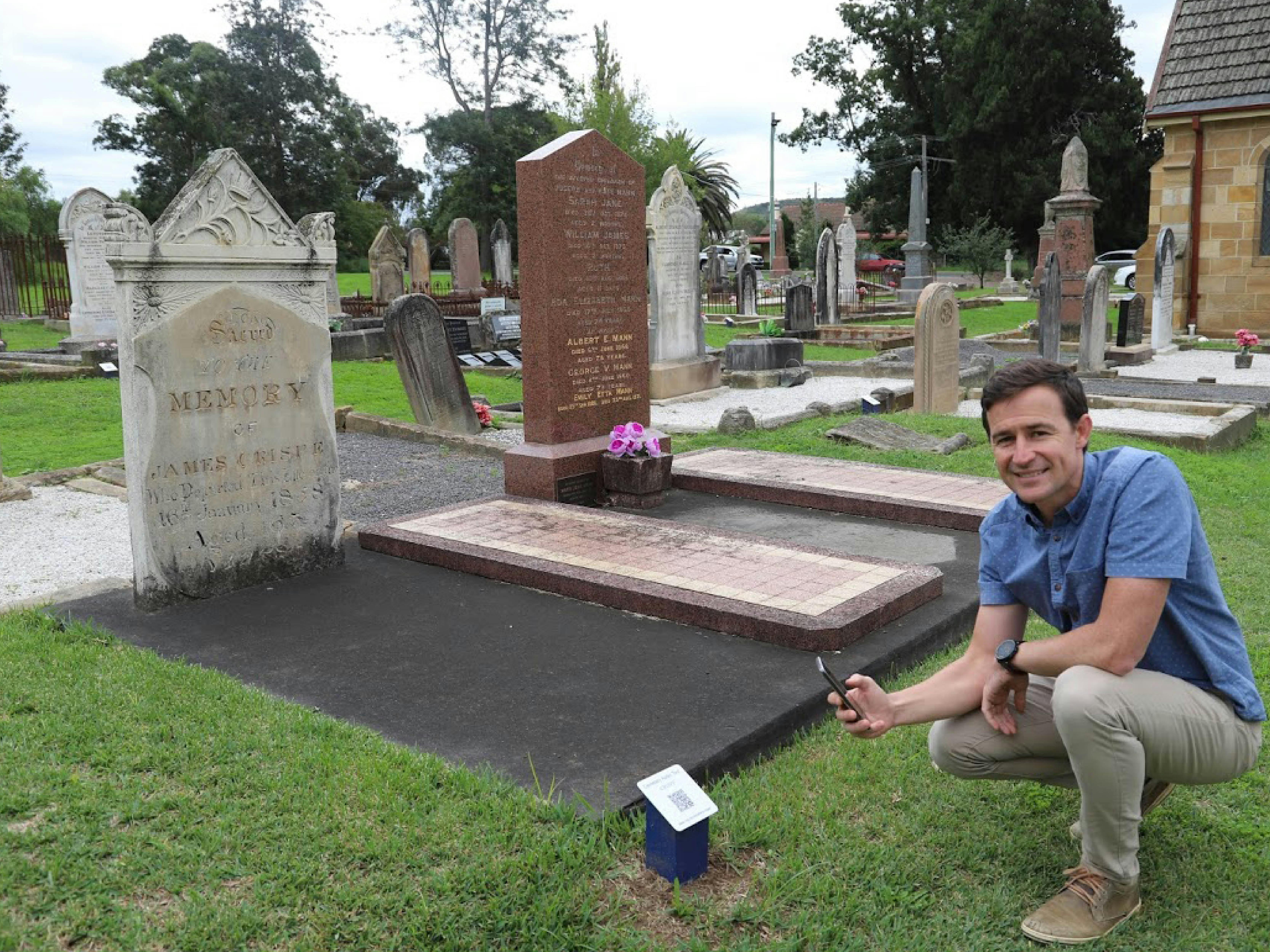 Man taking part in cemetery tour
