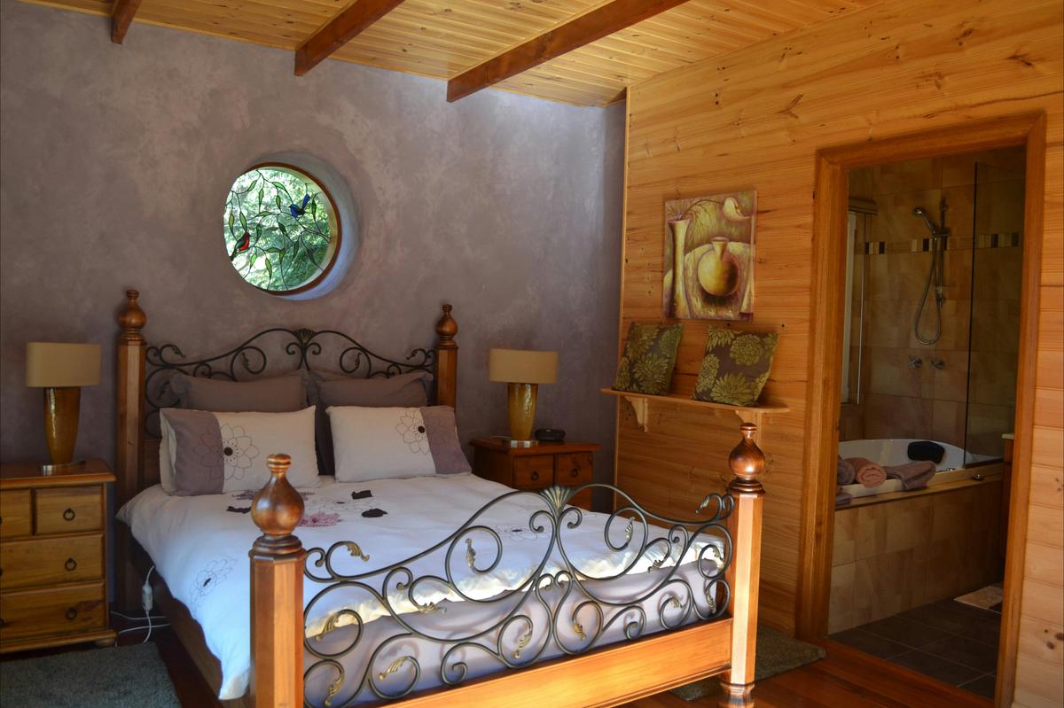 Strawbale Cottage  master bedroom and spa