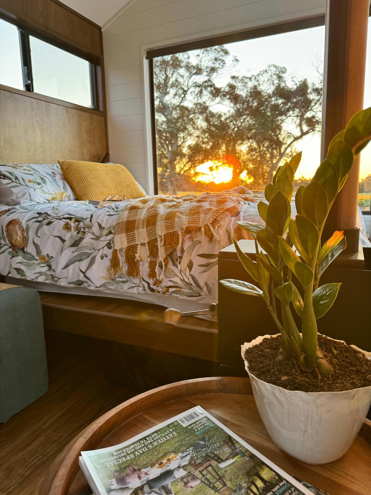 The queen-sized bed is in the perfect position to capyure the sunsets and sunrises.