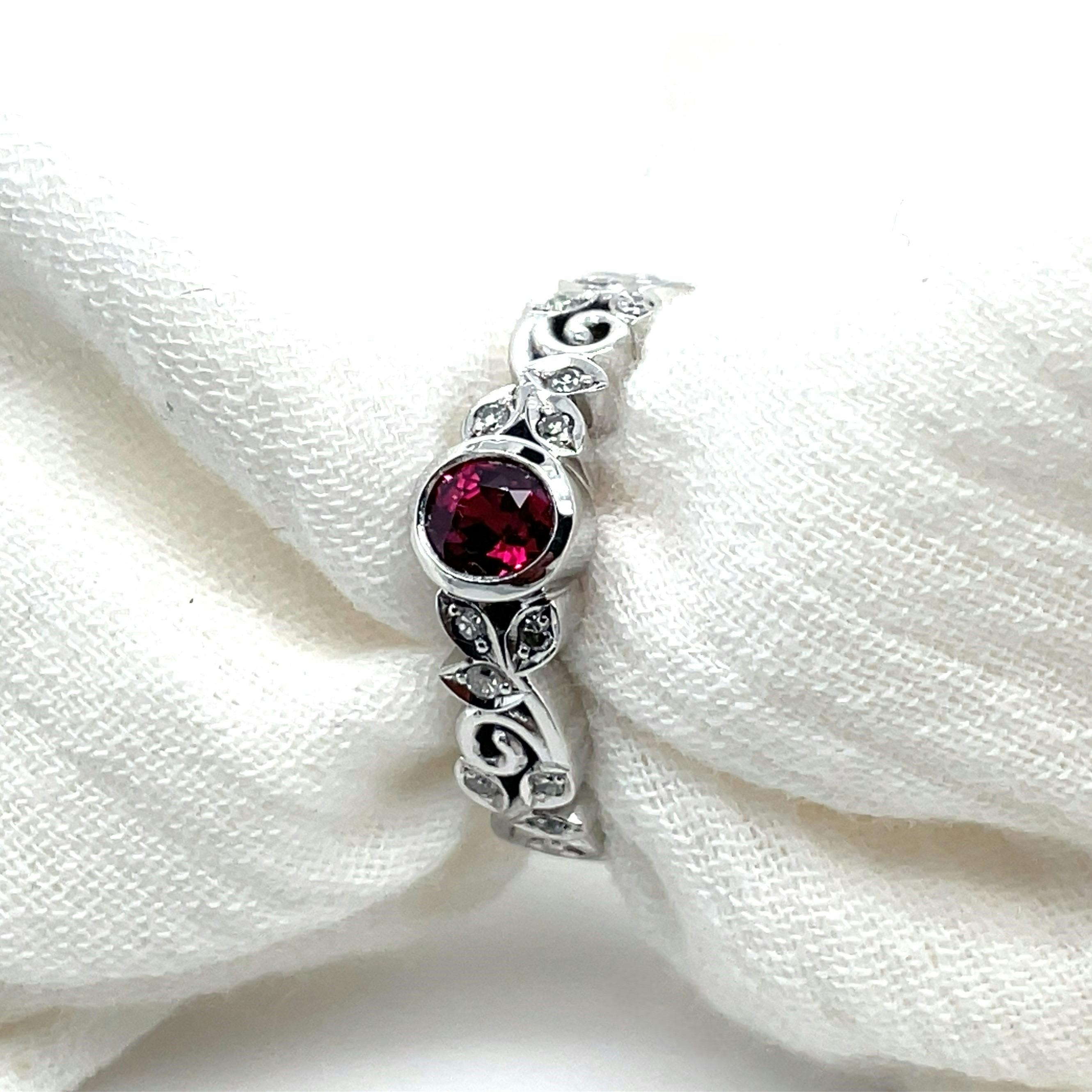 A repurposed ruby and diamonds were used to create this remodelled beauty.