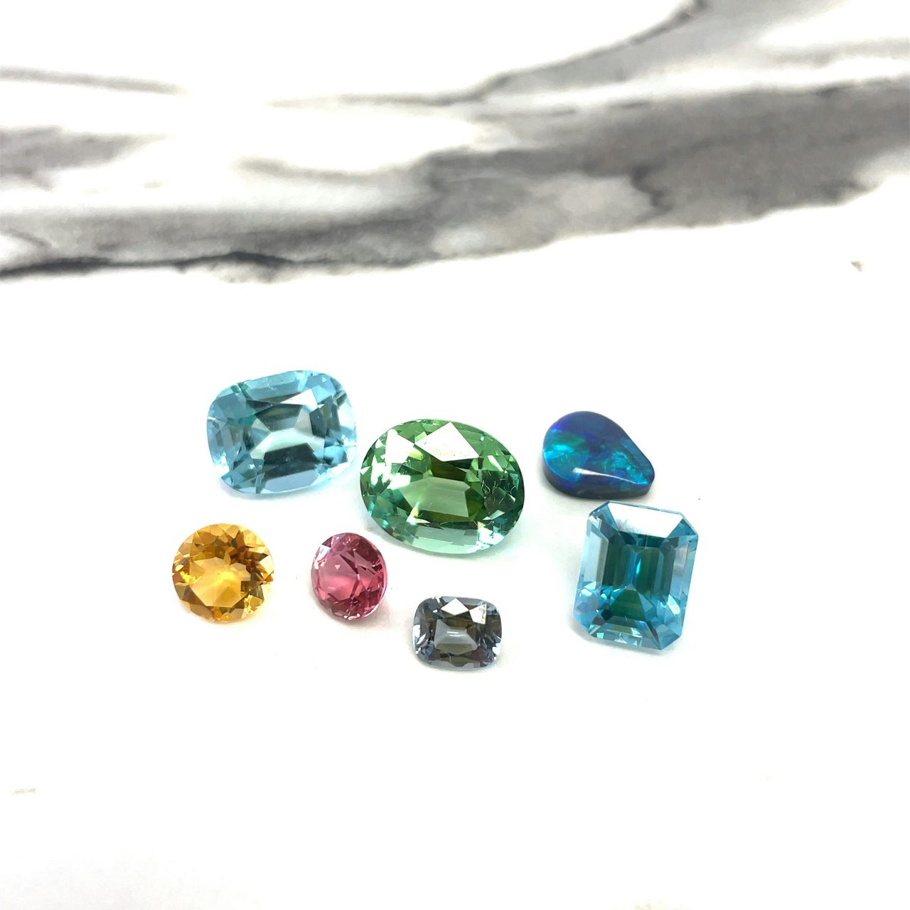 A variety of loose gemstones ready to be turned into custom jewellery.