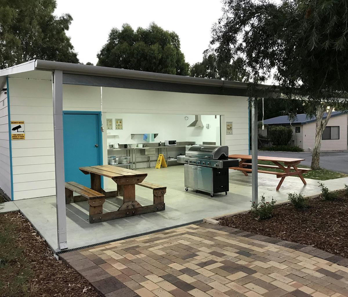 Camp Kitchen with a BBQ Area