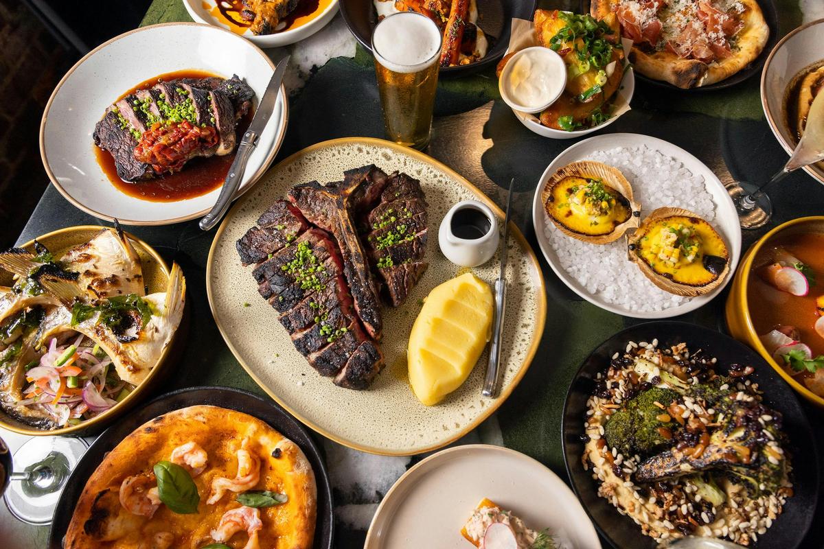 Cooking over charcoal and locally brewed beer and wine