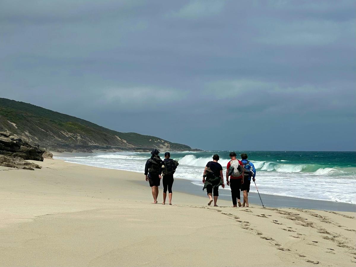 Hikers along Deepened Beach 7.5km.