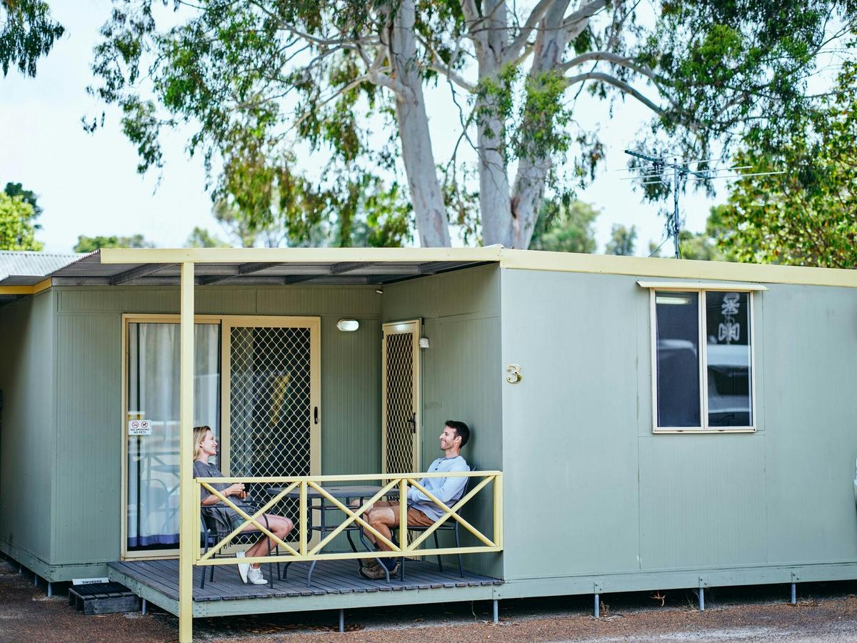 Relax on your private patio at Collie Tourist Park