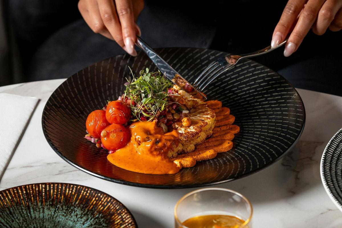 cutting through cauliflower steak