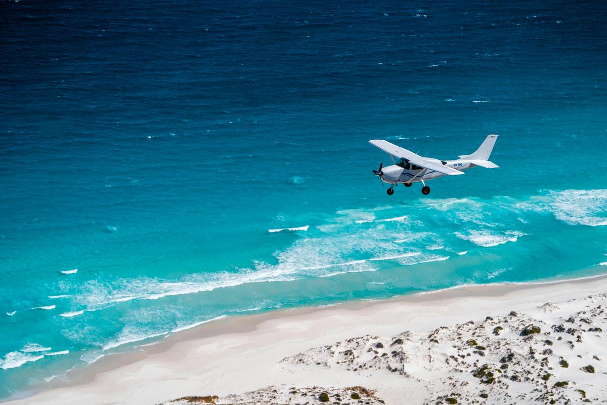 Fly Perth Plane Flying along Coast